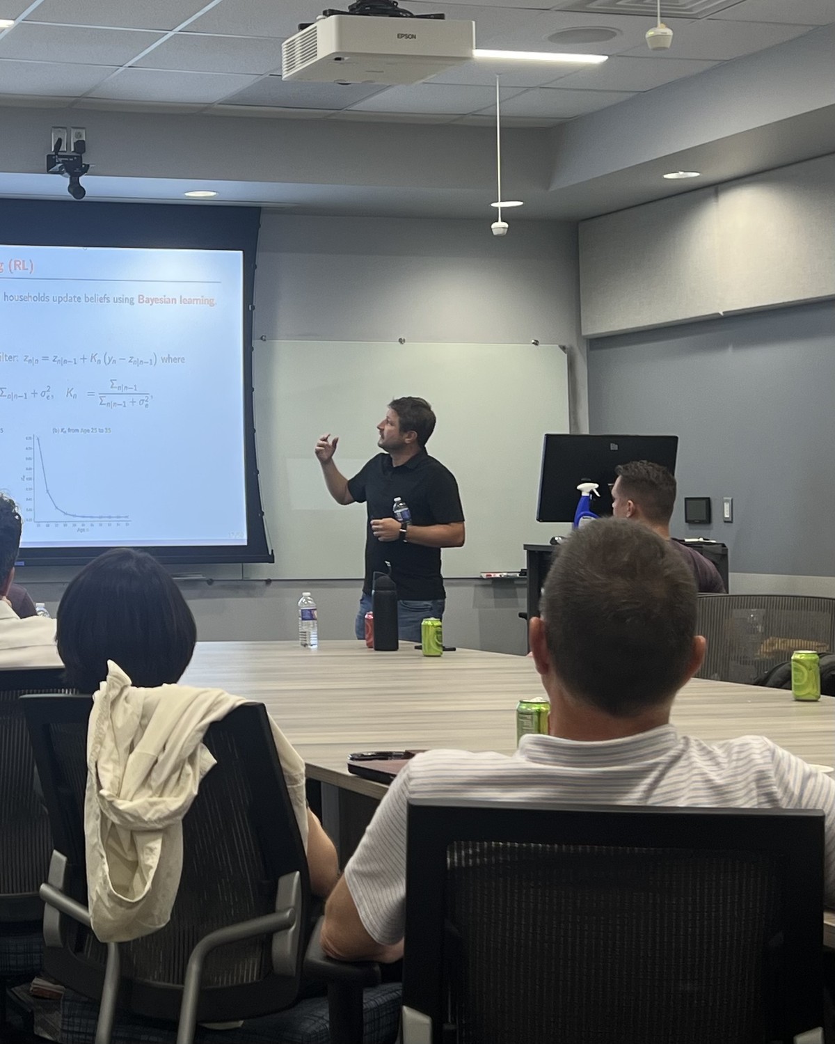 Juan M. Sánchez presenting research at a seminar